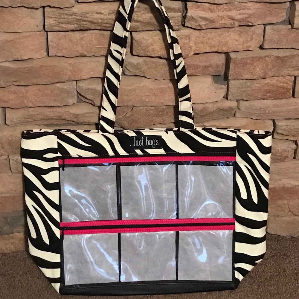 Brand New with plastic Luci Bag Zebra